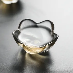 Elegant Japanese style crystal glass petal-shaped tea cup with gold leaf accent detail