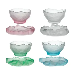 Frosted glass teacup set with textured saucers in pink green blue and white colors