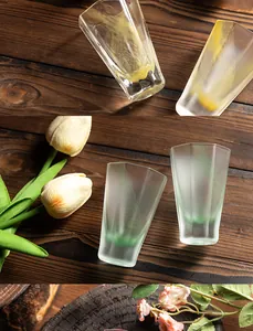 Detail of octagonal frosted glass tea smelling cup with elegant ribbon gradient