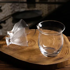 Handmade crystal glass tea set with bubble starry sky effect on a rustic wood base