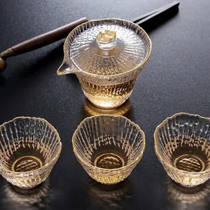 Service à thé en verre de style chinois avec texture martelée et gaiwan à bord doré avec tasses