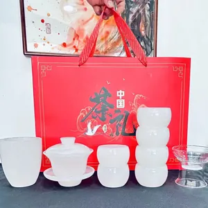 Elegant white jade Kung Fu tea set gift box including gaiwan, cups, and a pitcher
