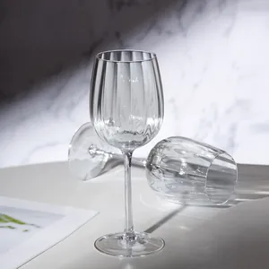 Elegant ribbed crystal Bordeaux wine glasses set with a vertical stripe texture.