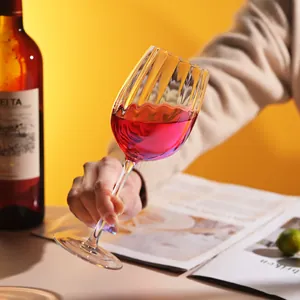 Elegant rainbow crystal wine glass with vertical fluted design for luxury home use