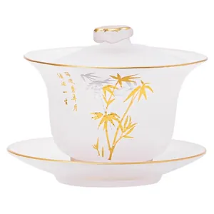 Handbemalte Gaiwan Teeschale aus gefrostetem Kristallglas mit goldenem Bambusmuster.