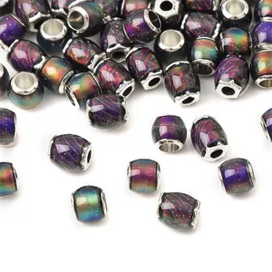 Temperature sensitive color changing resin beads with nebula pattern and alloy core