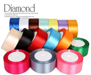 Variety of colorful satin ribbon rolls for DIY handmade flower making and craft projects
