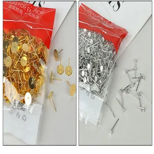 Close-up detail of bulk gold and silver color DIY earring stud posts in professional packaging