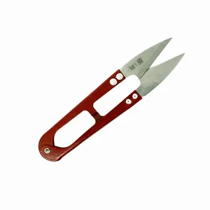 Detail shot of professional U-shaped thread snips for sewing and embroidery crafts