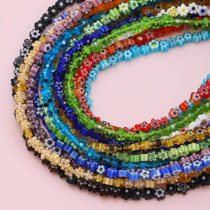 Detailed close-up view of colorful Millefiori glass flower beads for DIY jewelry making