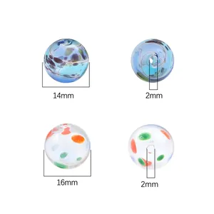 Detail view of 14mm and 16mm hand-painted hollow glass beads with 2mm holes