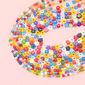 Close-up of colorful millefiori glass flower beads for DIY jewelry making accessories