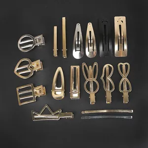 Assorted collection of gold and silver metal hair clip components for DIY hair accessory making