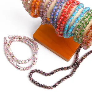 Vibrant faceted lampwork wheel beads with vintage floral patterns for DIY jewelry making