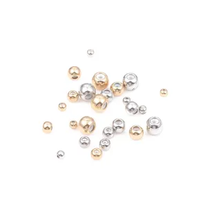 Assorted gold and silver copper round silicone slider beads for DIY jewelry making