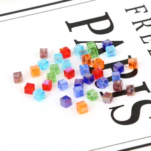Close-up of 3mm colorful square glass crystal beads for DIY jewelry making accessories