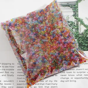 Bulk pack of colorful transparent glass seed beads for DIY jewelry making and crafts.