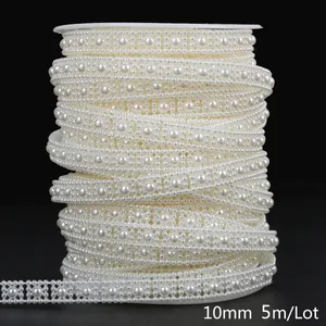 Detailed macro view of 10mm ABS off-white pearl bead chain trim for DIY craft projects