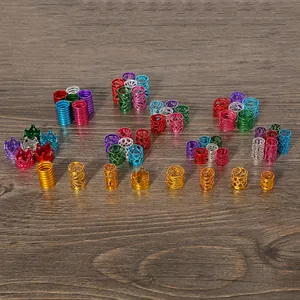 Close-up of mixed colorful aluminum beads and hair cuffs for DIY jewelry accessories