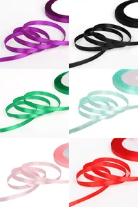 Detail view of 7mm satin ribbons in various colors for DIY hair accessories