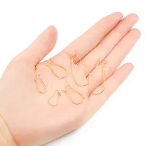 Gold U-shape iron earring hooks for DIY jewelry making in various sizes on hand