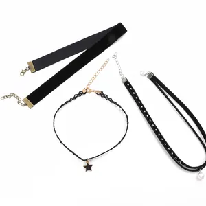 Detail of ribbon end crimps and lobster clasps on various black choker necklaces