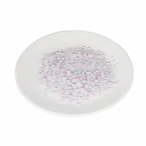 Mixed sizes of iridescent pastel blue and pink flatback half pearls for nail art and DIY