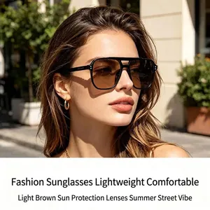 Nahaufnahme einer quadratischen Doppelsteg-Sonnenbrille mit hellbraunen Gläsern