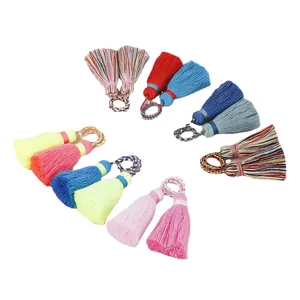 Assortiment de pompons colorés faits main à double tête pour bijoux DIY et pendentifs variés