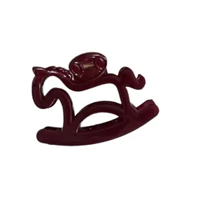 Cute rocking horse shaped hair claw clip in deep burgundy finish for women
