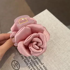 Elegant pink satin rose hair claw clip with French style floral design