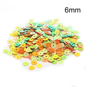 Detailed macro view of 6mm iridescent round sequins for DIY jewelry making crafts