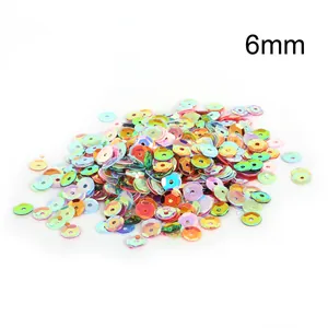 Macro detail view of 6mm iridescent round sequins for DIY craft jewelry making.
