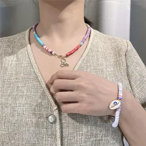 Ensemble collier et bracelet fait main en perles de pâte polymère de 6mm colorées