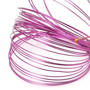 Coiled magenta aluminum wire for DIY crafts and bonsai styling, 10 meters long.