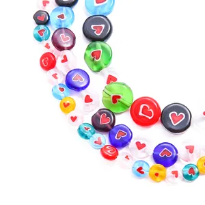 Close-up of colorful millefiori glass heart beads for DIY jewelry making crafts