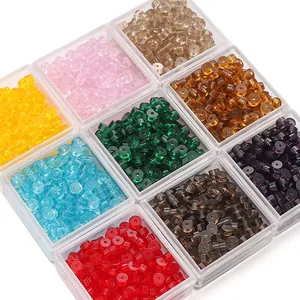 Detailed view of colorful 2x4mm flat round glass beads for DIY jewelry making accessories.