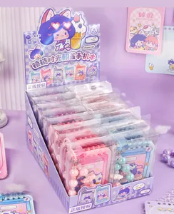 Detailed macro view of cute phone-shaped flip notebooks in a purple display case