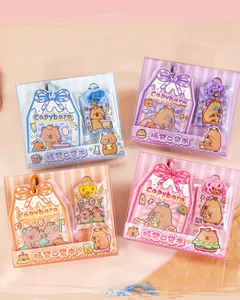 Detailed view of four colorful Capybara themed lucky bag stationery sets in packaging