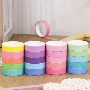 Colorful washi tape set for scrapbooking and DIY decorative crafts in soft pastels