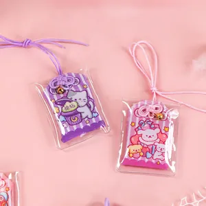 Cute cartoon omamori-style mini portable pocket notebooks in purple and pink designs