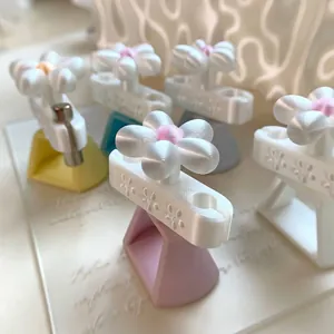 3D printed floral nail art magnets for cat eye polish in pastel colors and rotating design