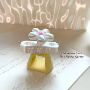 Professional 3D printed magnetic nail art spinner tool with white flower and yellow base