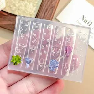 Clear silicone mold for tulip bouquet resin casting and 3D flower nail art decoration.