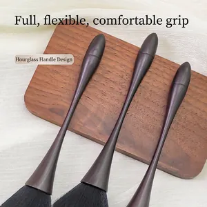 Minimalist large nail dust brush featuring ergonomic ultra-soft wasp-waist handle