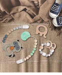 Sujetachupetes de silicona de grado alimenticio y juego de mordedores de madera para bebés