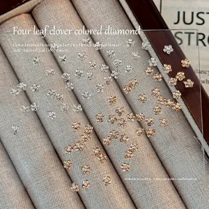 Hoogwaardige sprankelende 3D metalen klavertje vier bloem strass voor nail art decoratie