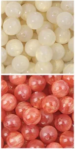 Close-up of resin gold sand imitation cat's eye round beads for DIY jewelry making