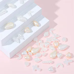 Assorted white ABS imitation pearl beads in heart and teardrop shapes for DIY jewelry making