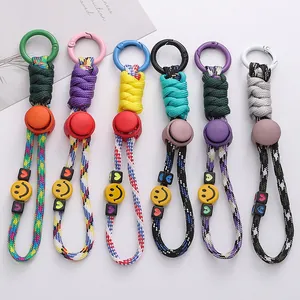 Candy colored polyester braided paracord keychains with smiley face and heart beads